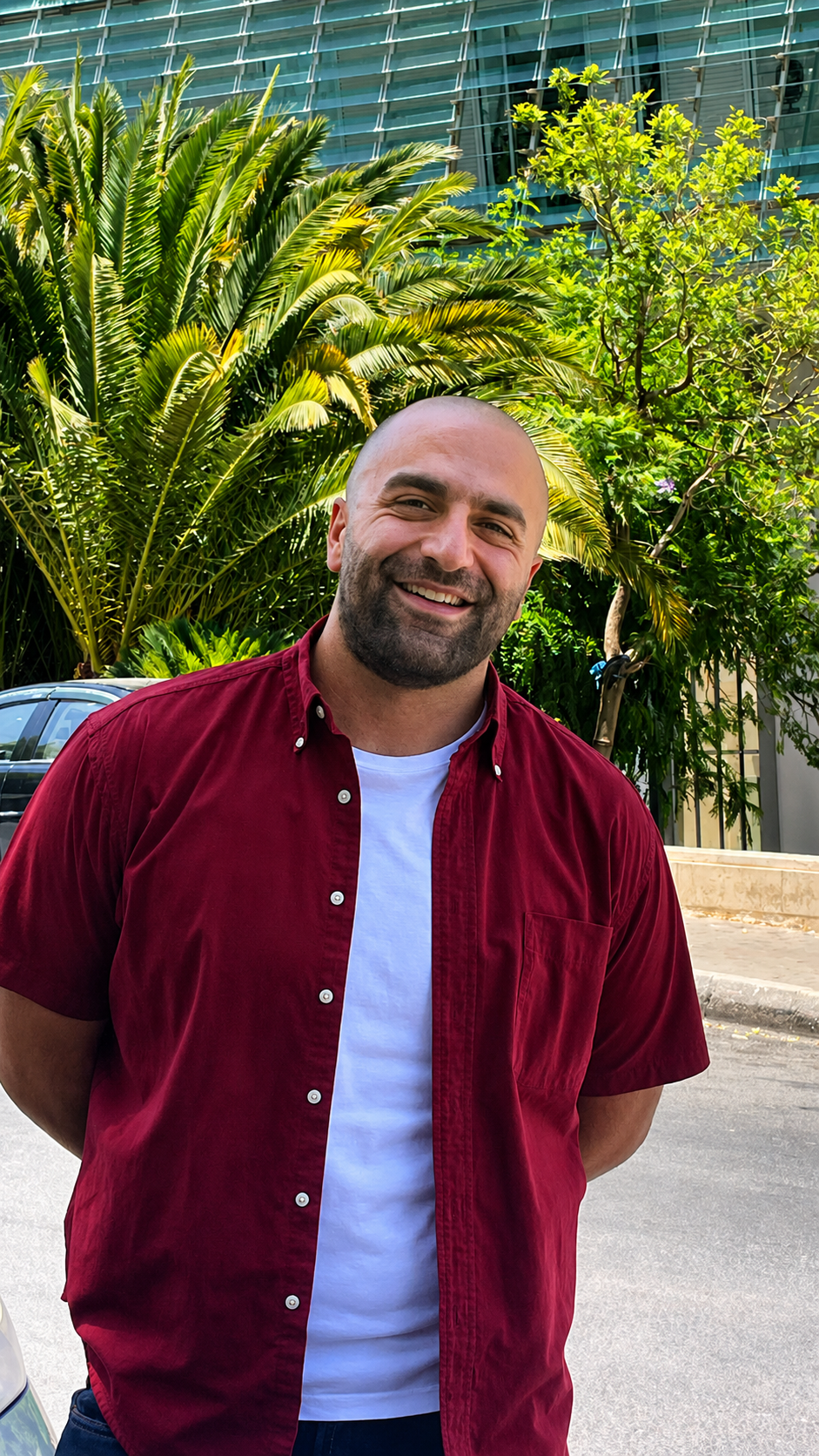 Kareem Rizik smiling outdoors